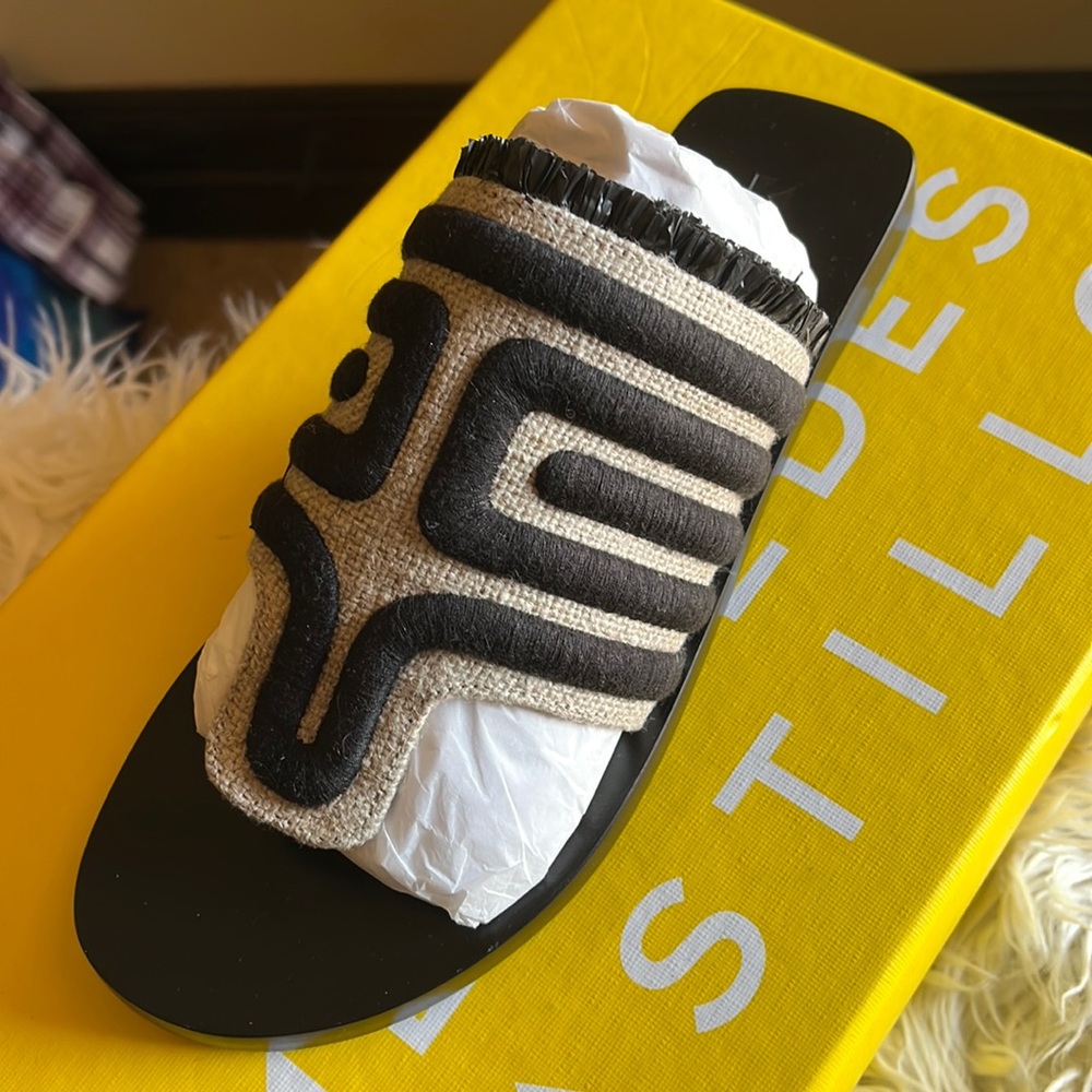 Mercedes Castillo black sandals.